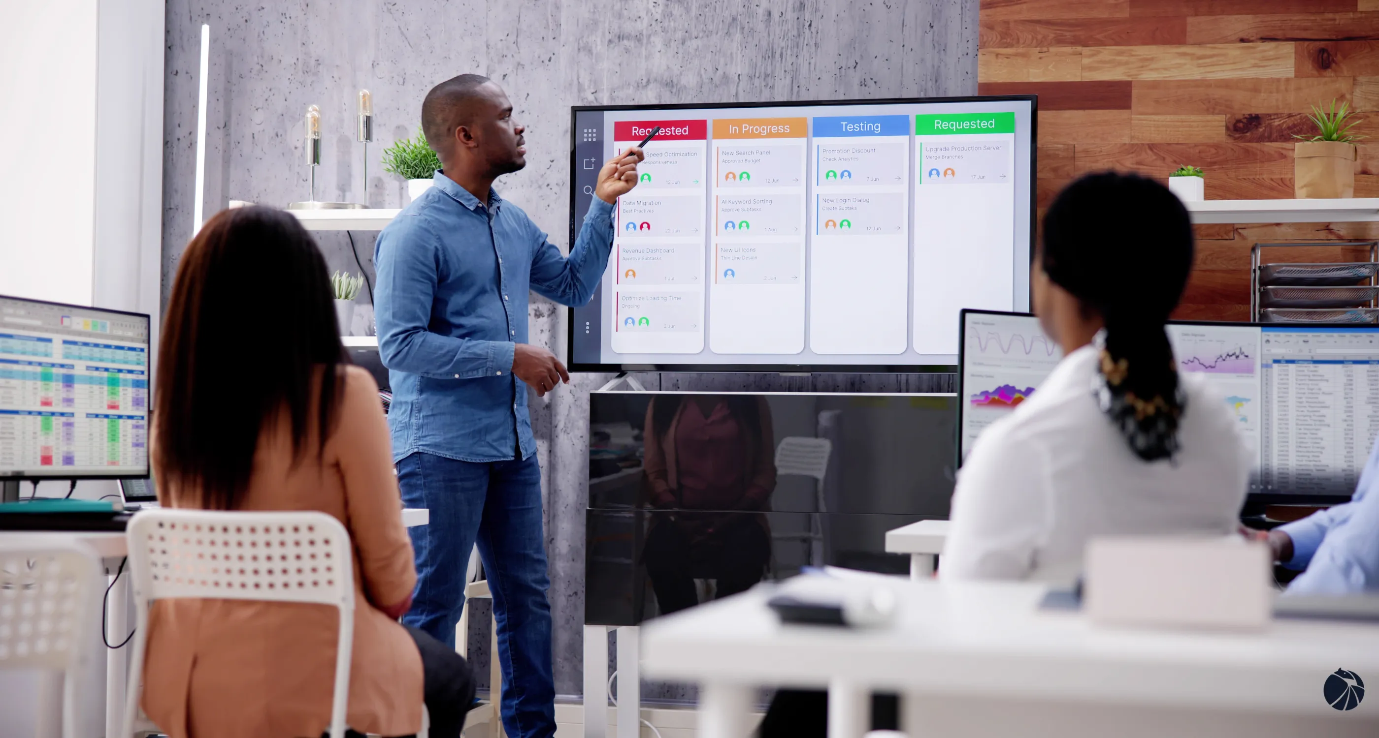 An instructor walking a team through a ticket workflow board on screen.